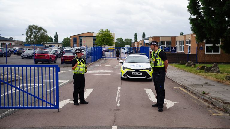 Emergency services at Tewkesbury School in Gloucesershire, which has been locked down after a teenage boy was arrested following reports a pupil stabbed a teacher. Picture date: Monday July 10, 2023.