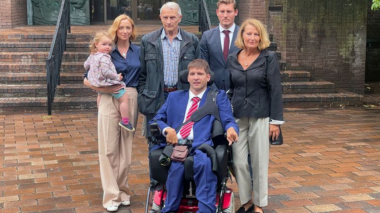 Tom Somerset-How with his family outside court
