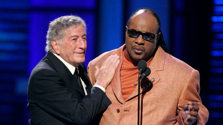 Tony Bennett is joined by Stevie Wonder as he accepts the century award at the Billboard Music Awards in 2006