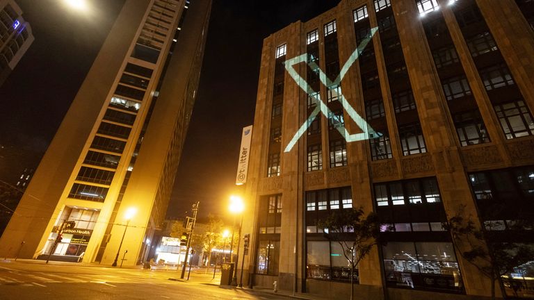 Twitter's new logo is projected on the company's headquarters building in downtown San Francisco, California, U.S., July 23, 2023. Reuters/Carlos Barria