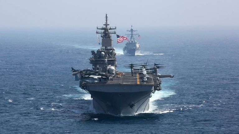 The amphibious assault ship USS Kearsage and the Arleigh Burke-class guided missile destroyer USS Bainbridge sail in formation in the Arabian Sea as part of the USS Abraham Lincoln aircraft carrier strike group.Image: Associated Press