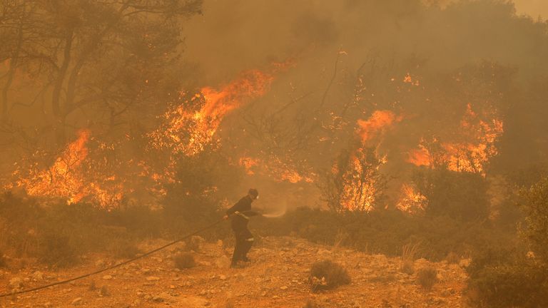 Fires are continuing to threaten villages near Athens
