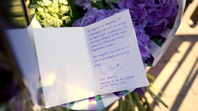 Flowers left at the scene by Ian Hewitt, chairman of the All England Lawn Tennis club