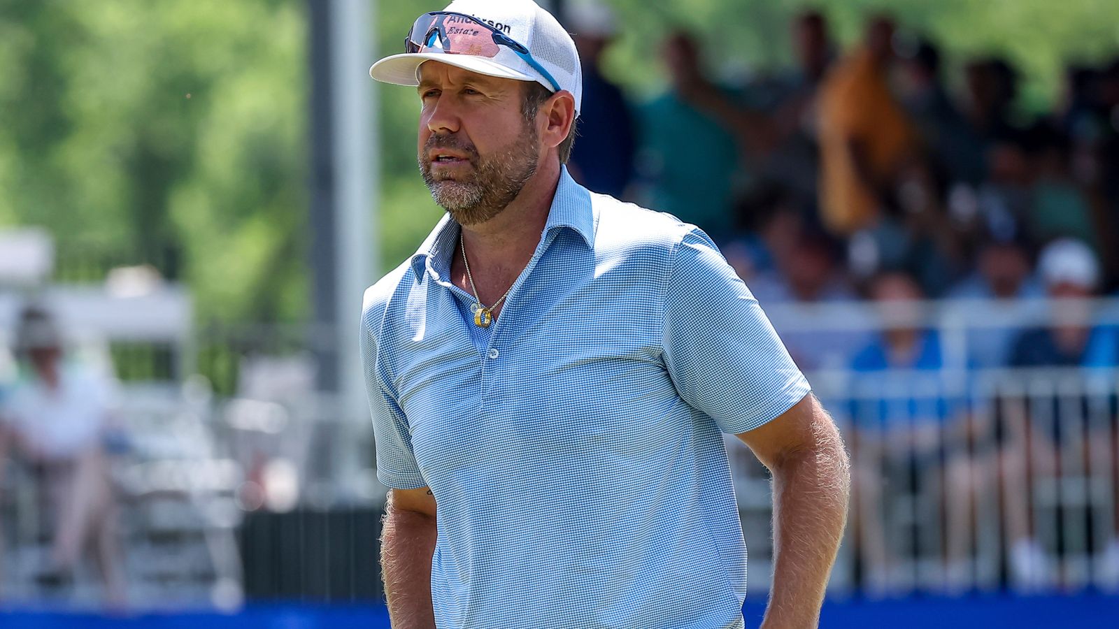 Erik Compton: Heart transplant golfer charged after 'pushing wife against wall', Miami police say
