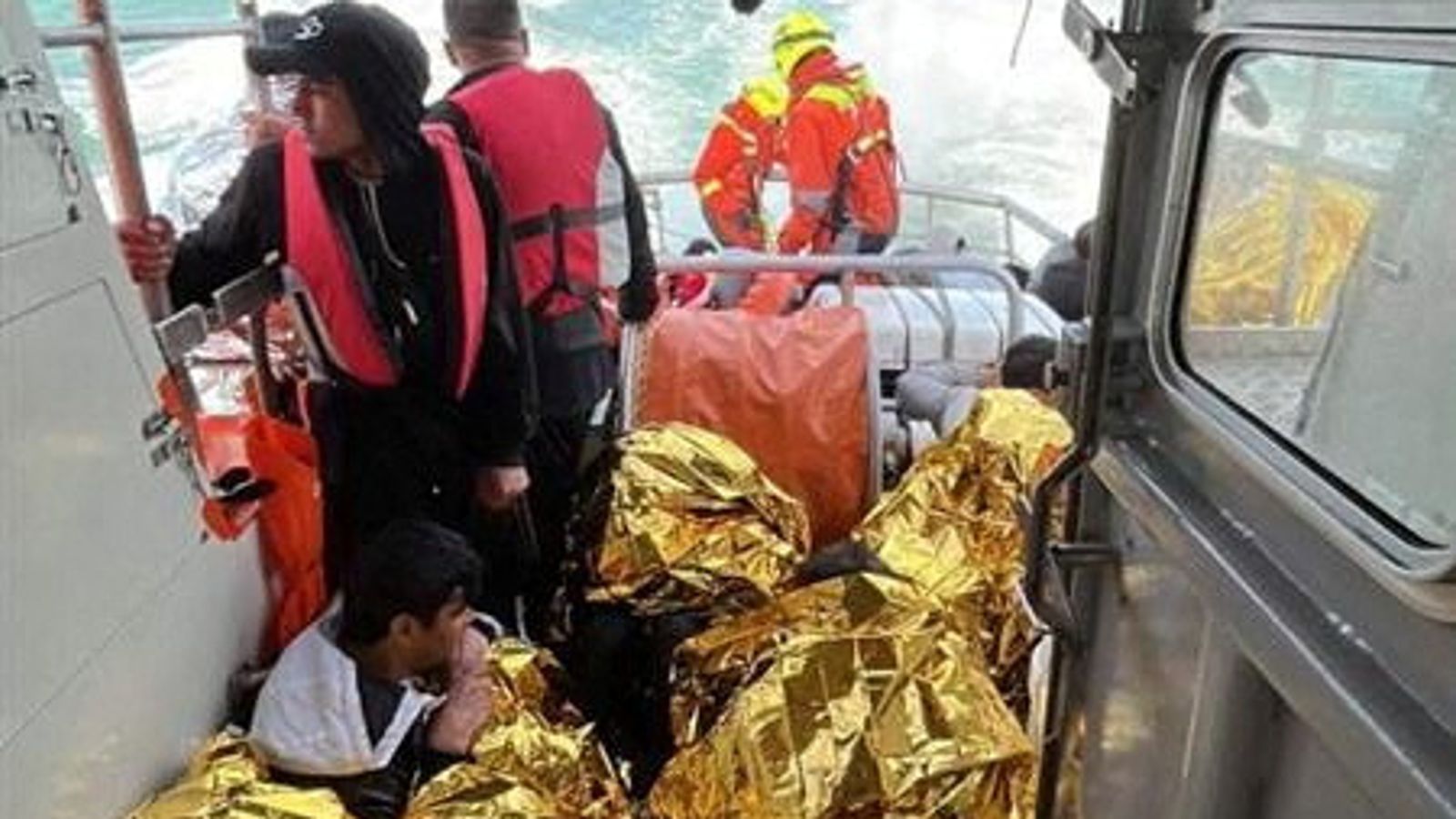 At least six people dead and dozens rescued as migrant boat crossing Channel capsizes