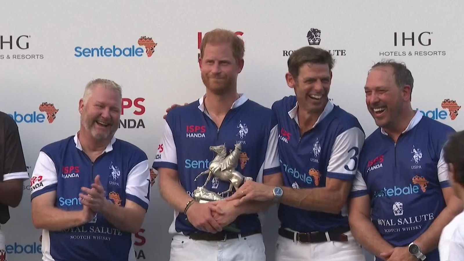 Prince Harry takes part in charity polo match in Singapore while Meghan ...