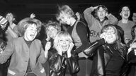 Screaming women fans of the pop group The Beatles at one of their concerts in Manchester