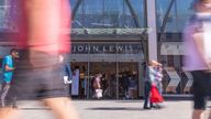 21st September, 2019 - Busy Shoppers in the centre of Cheltenham in The Cotswolds, walking past the newly opened John Lewis & Partners store in the High Street
