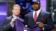 Oher pictured with the NFL commissioner in 2009 when he was drafted by Baltimore Ravens