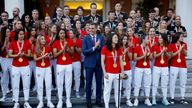 Spain&#39;s Ivana Andres gives a speech as prime minister Pedro Sanchez and players applaud during the ceremony