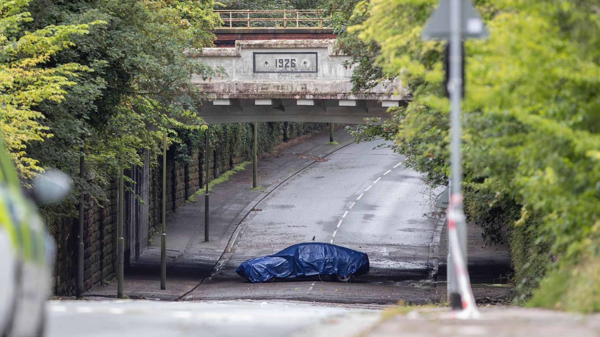 Man and woman die after Mercedes car driven into flooded area in