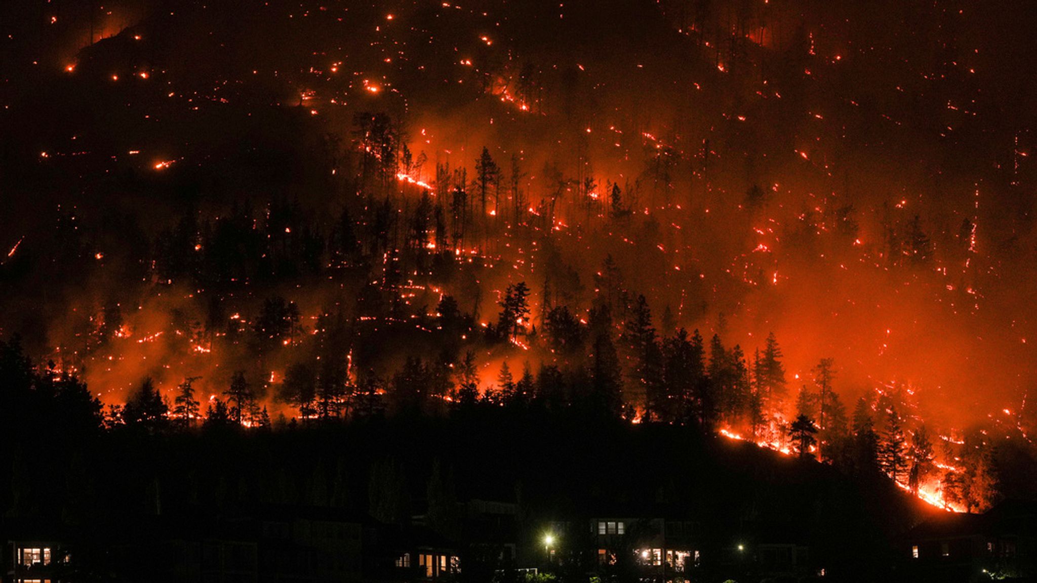 Canada wildfires force thousands to flee as state of emergency declared ...