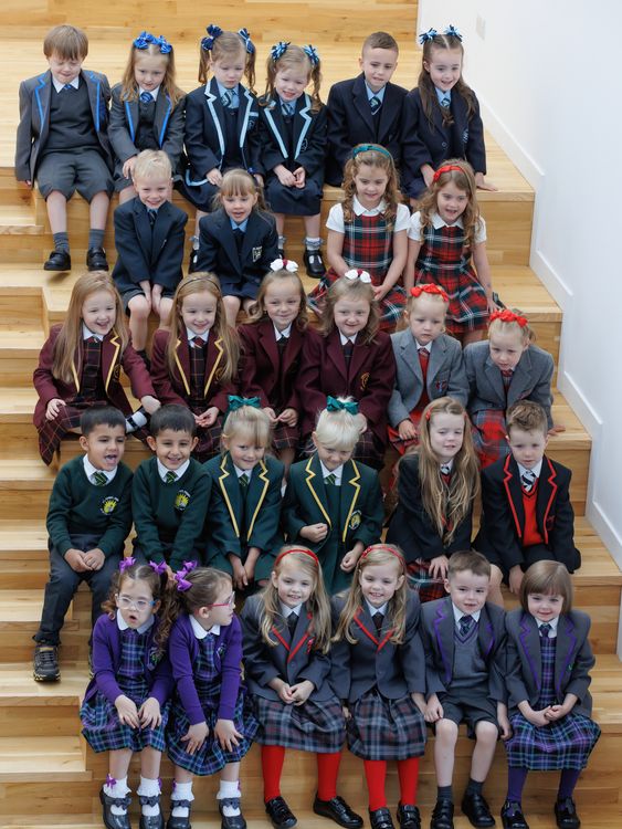 Seventeen sets of twins due to start the new school term in the Inverclyde area pose for a photograph at St Patrick&#39;s Primary in Greenock, Inverclyde, ahead of their first day at school. Picture date: Friday August 11, 2023.