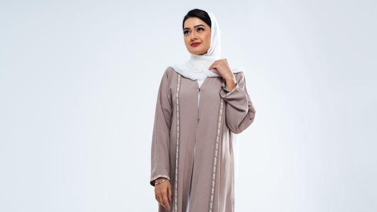 Arabic middle-eastern woman with traditional abaya dress in studio - Arabic muslim adult female portrait in Dubai, United Arab Emirates