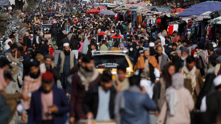 People walk in a street in Kabul, Afghanistan, November 9, 2022. REUTERS/Ali Khara