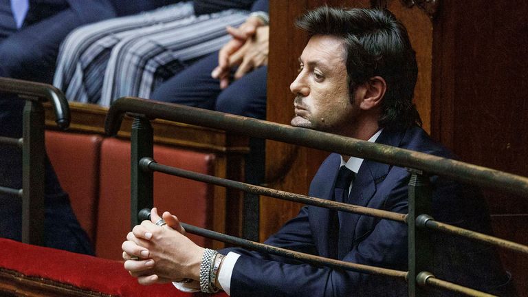 Andrea Giambruno, partner of Italian Premier Giorgia Meloni watches her speaking in parliament