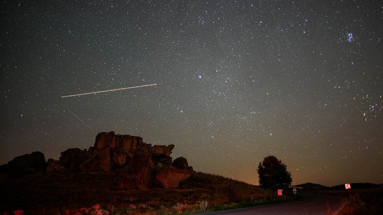 People visit the Phrygian Valley in Afyonkarahisar, 250 km south-west of Ankara, to watch the Perseid meteor shower, Saturday, Aug. 12, 2023. (AP Photo/Emrah Gurel)