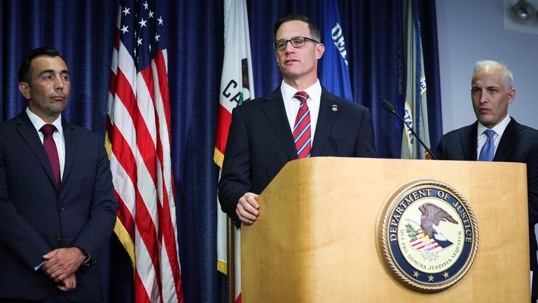 U.S. Attorney Randy S. Grossman for the Southern District of California, center, speaks during a press conference at the U.S. Attorney&#39;s Office for the Southern District of California on Thursday, Aug. 3, 2023, in San Diego. Two U.S. Navy sailors have been arrested and accused of providing sensitive military information to China ... including details on wartime exercises, Naval operations and critical technical material, federal officials said Thursday. (Meg McLaughlin/The San Diego Union-Tribune via AP)