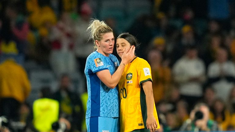Millie Bright, left, consoles Australia forward Sam Kerr after the semi-final. Pic: AP