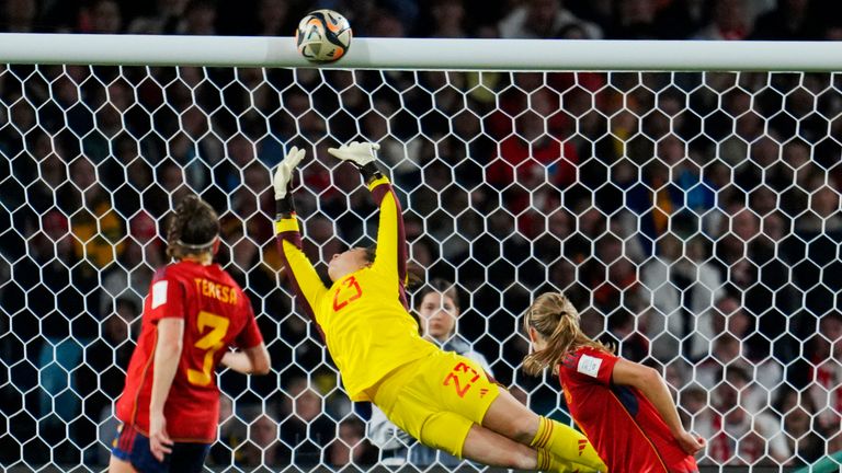 A shot from England&#39;s Lauren Hemp, right, hits the crossbar during the Women&#39;s World Cup soccer final between Spain and England at Stadium Australia in Sydney, Australia, Sunday, Aug. 20, 2023. (AP Photo/Abbie Parr)