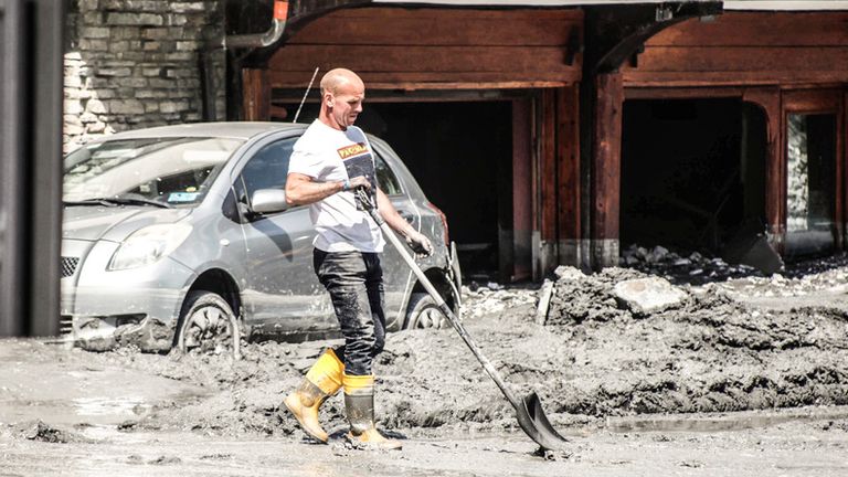 The town in the Val di Susa valley is facing a major clean-up. Pic: AP