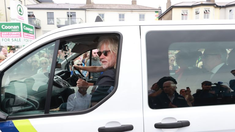 Bob Geldof rides in a taxi as part of the funeral cortege for Sinead O&#39;Connor as the procession passes through her former hometown of Bray, Co Wicklow, ahead of a private burial service. Picture date: Tuesday August 8, 2023.