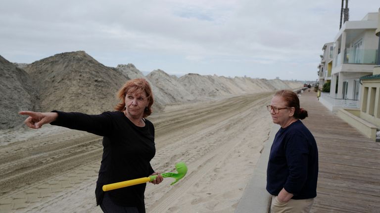 Long time resident of Long Beach, Gabriella Holt, prepares her home that sits on the strand for Hurricane Hilary&#39;s arrival in Long Beach, California, U.S. August 19, 2023. REUTERS/Zaydee Sanchez