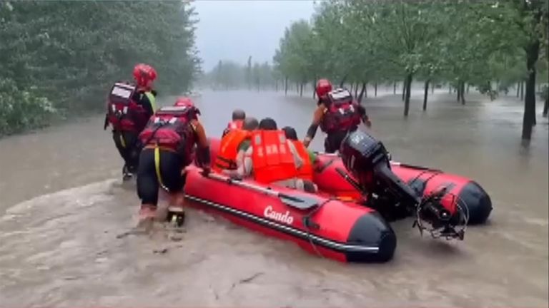 Torrential rain in areas around China&#39;s capital, Beijing, killed several, the government reported Tuesday, as flooding destroyed roads, uprooted trees and knocked out power.