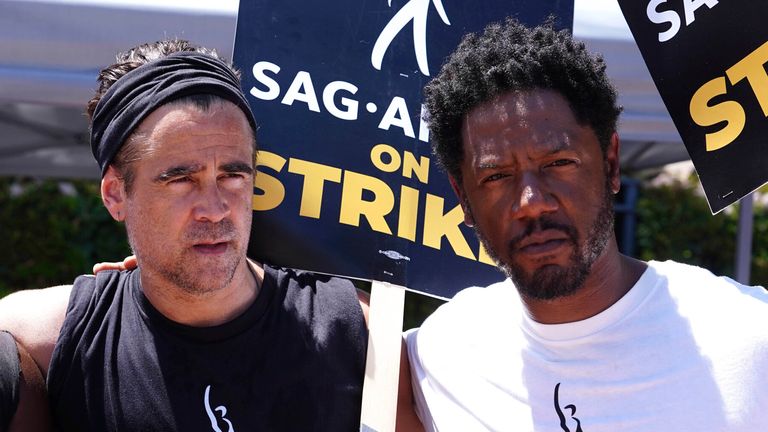 Colin Farrell, Akeem Mair and Tory Kittles walk the picket line in support of the SAG-AFTRA and WGA strike on July 26, 2023  