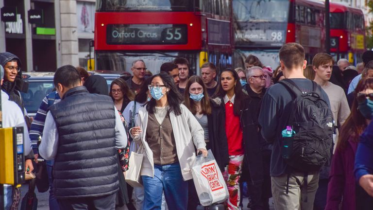 People wearing protective face masks on a busy Oxford Street during the coronavirus pandemic. Pic: iStock