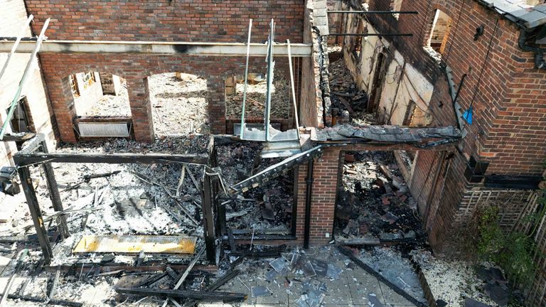 The burnt out remains of The Crooked House pub near Dudley. A fire gutted the 18th century pub just days after it was sold to a private buyer. Firefighters and police were called to the pub in Himley, West Midlands, at 10.45pm on Saturday. The blaze was extinguished and no-one was reported to have been injured, Staffordshire Police said. Picture date: Monday August 7, 2023.