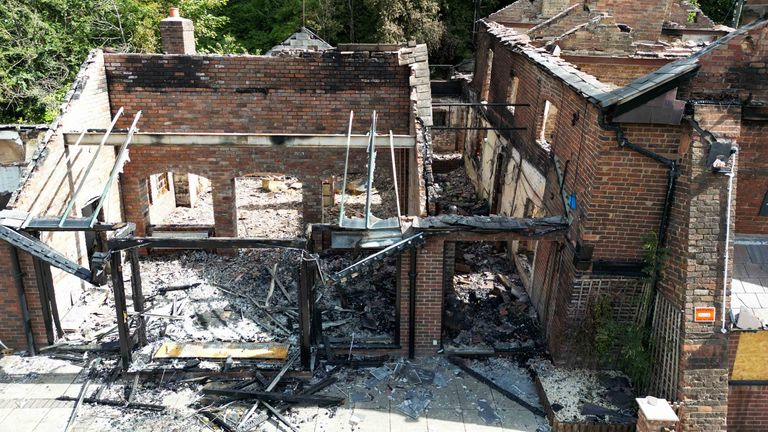 The burnt out remains of The Crooked House pub near Dudley. A fire gutted the 18th century pub just days after it was sold to a private buyer. Firefighters and police were called to the pub in Himley, West Midlands, at 10.45pm on Saturday. The blaze was extinguished and no-one was reported to have been injured, Staffordshire Police said. Picture date: Monday August 7, 2023.