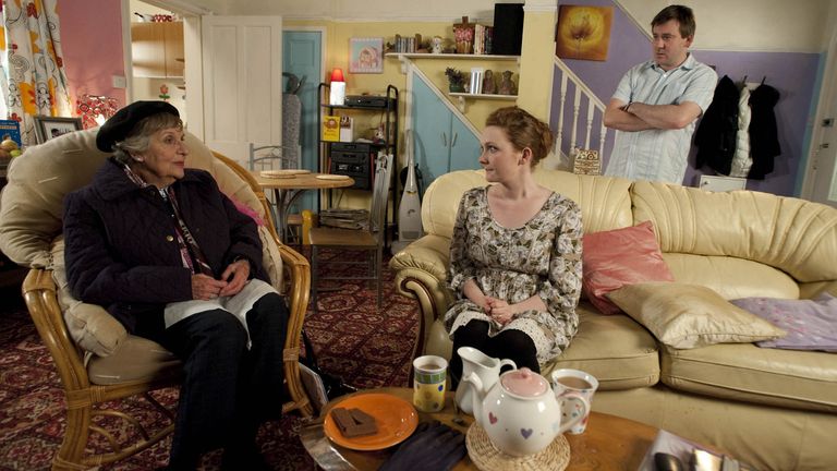 John Stape [Graeme Hawley] arrives home to find Fiz Stape [Jennie McAlpine] talking with Joy Fishwick [Doreen Mantle].

2010