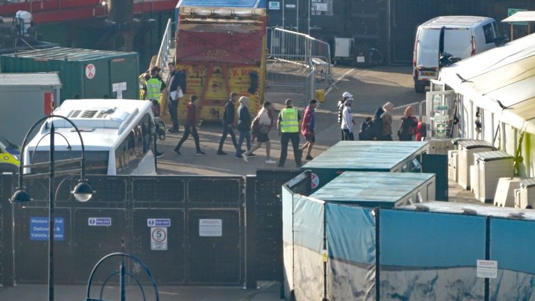 A group of people thought to be migrants are brought in to Dover, Kent, from the Dover Lifeboat following a small boat incident in the Channel. Picture date: Thursday August 10, 2023.

