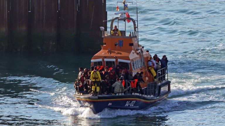 A group of people thought to be migrants are brought in to Dover, Kent, onboard the Ramsgate Lifeboat following a small boat incident in the Channel. Picture date: Thursday August 10, 2023.