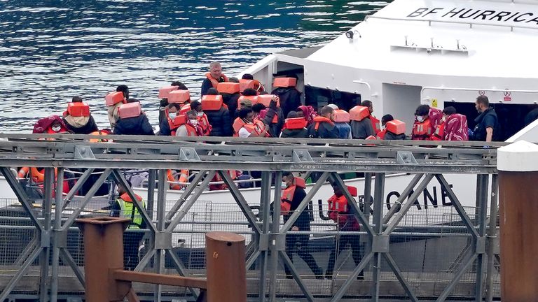 A group of people thought to be migrants are brought in to Dover, Kent, onboard a Border Force vessel after being rescued during a small boat incident in the Channel. Picture date: Friday July 14th, 2023.