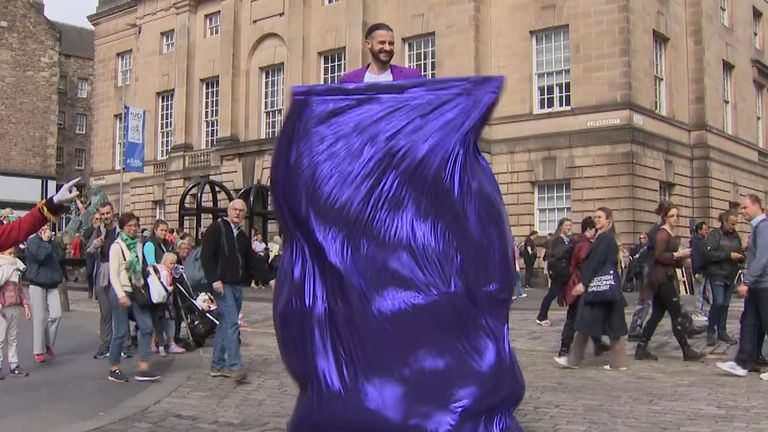 Magicians perform a trick at the Edinburgh Fringe 
