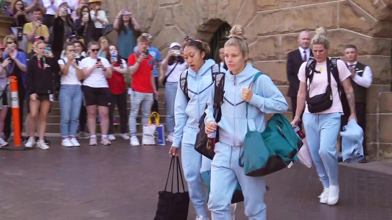 England stars Lauren James (left), Rachel Daly (centre) and Millie bright (back right) board the England team coach outside the hotel as the Lionesses head to the airport to return to the UK after the Women&#39;s World Cup.