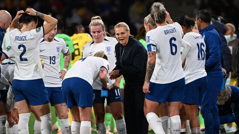 England coach Sarina Wiegman and the team