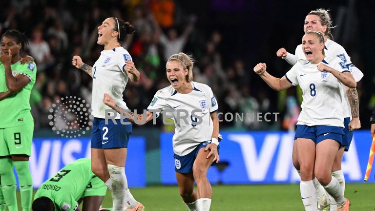 England Women celebrate during their penalty shootout win over Nigeria