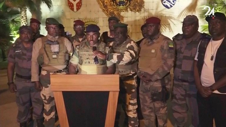 Gabonese military appear on television as they announce they have seized power. Pic: AP