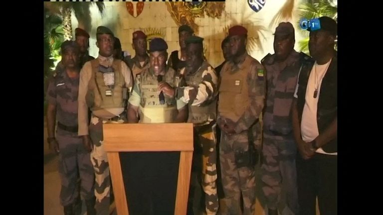 Gabonese military appear on television as they announce they have seized power.