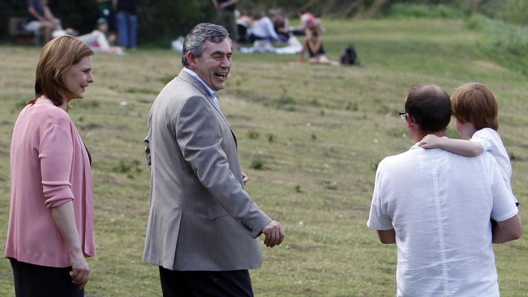 Prime Minister Gordon Brown and his wife Sarah walk through Whitlingham Country Park in Trowse