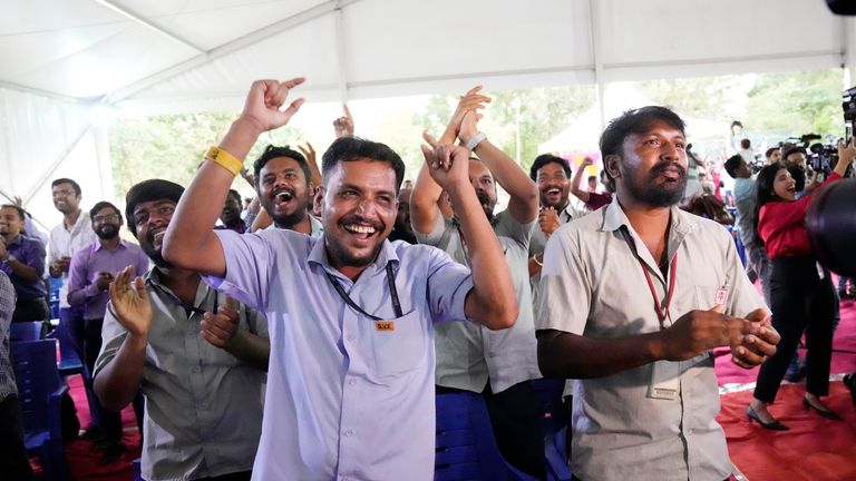Indian Space Research Organization (ISRO) staff celebrate the successful landing of spacecraft Chandrayaan-3 on the moon 