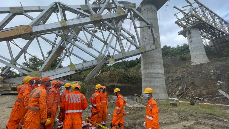 India: Dozens killed as railway bridge collapses during construction ...