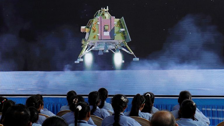 People watch a live stream of Chandrayaan-3 spacecraft&#39;s landing on the moon, inside an auditorium of Gujarat Science City in Ahmedabad, India, August 23, 2023. REUTERS/Amit Dave
