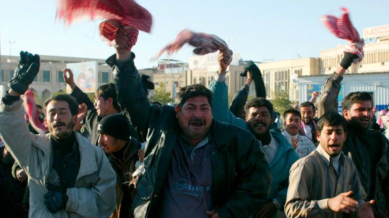 Iraqis celebrate after Hussein&#39;s execution