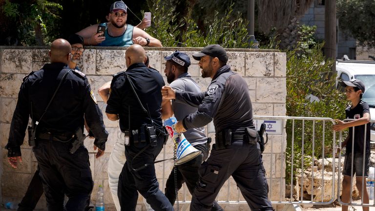 Police arrest an Israeli activist at a protest near the home of far-right national security minister Itamar Ben Gvir 