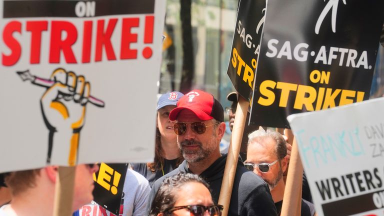 Actor Jason Sudeikis, walks a picket line with striking writers and actors, Friday, July 14, 2023, at NBC Universal Studios in New York.  
Pic:AP
