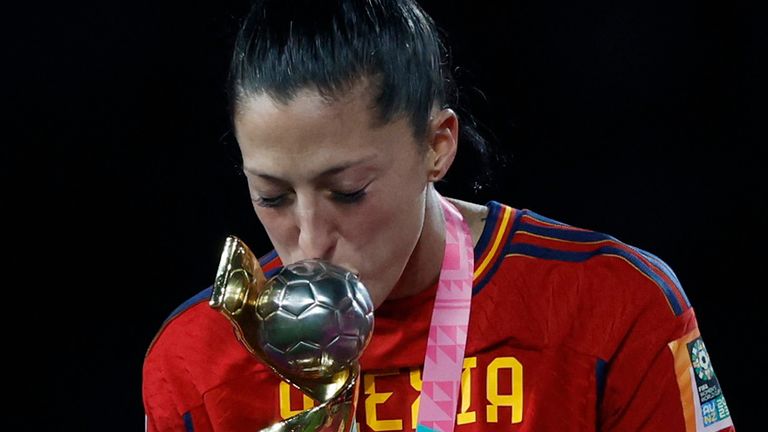 Jennifer Hermoso celebrates with the World Cup trophy